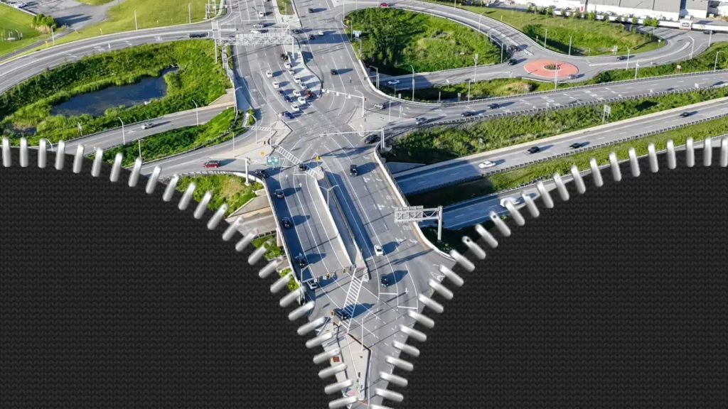 Freeway with an overlay of unzipped zipper