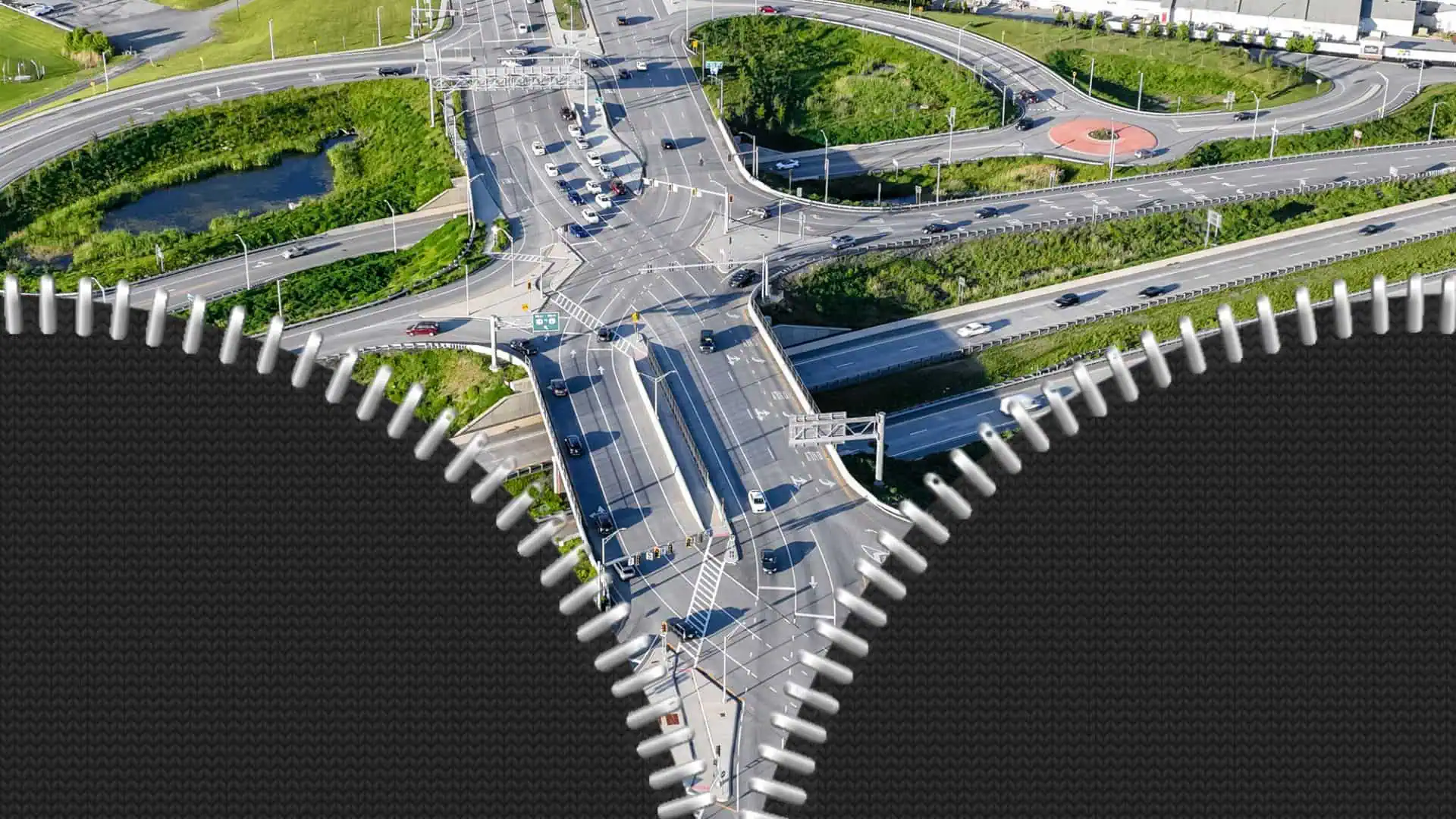 Freeway with an overlay of unzipped zipper