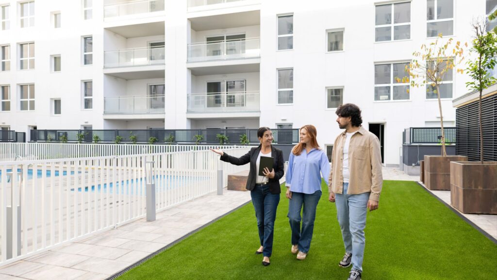 A couple exploring an apartment complex